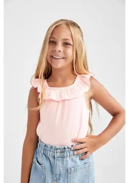 DeFacto Kız Çocuk Regular Fit Volanlı Pamuklu Atlet: Şıklık ve Konforun Buluşması