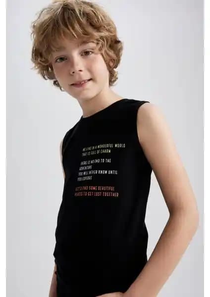 DeFacto Erkek Çocuk Bisiklet Yaka Atlet: Yaz Ayları İçin Rahat ve Şık Seçenek