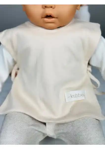 Kube Pamuklu ve Madebyalm Sıvı Geçirmez Mama Önlüğü Karşılaştırması