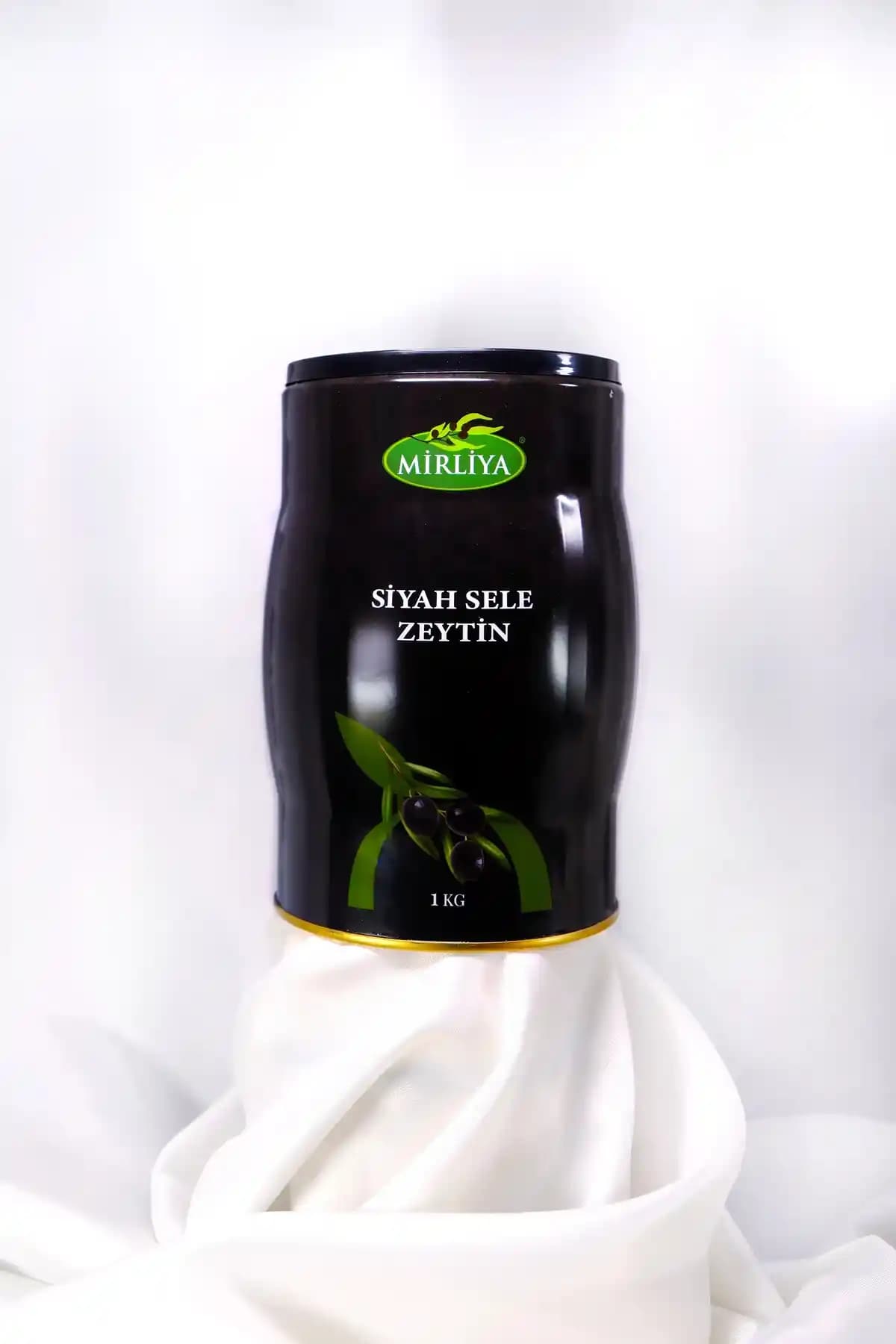Mirliya Siyah Sele Zeytin 1 Kg Teneke: Doğal Fermantasyonla Lezzet ve Çok Yönlü Kullanım