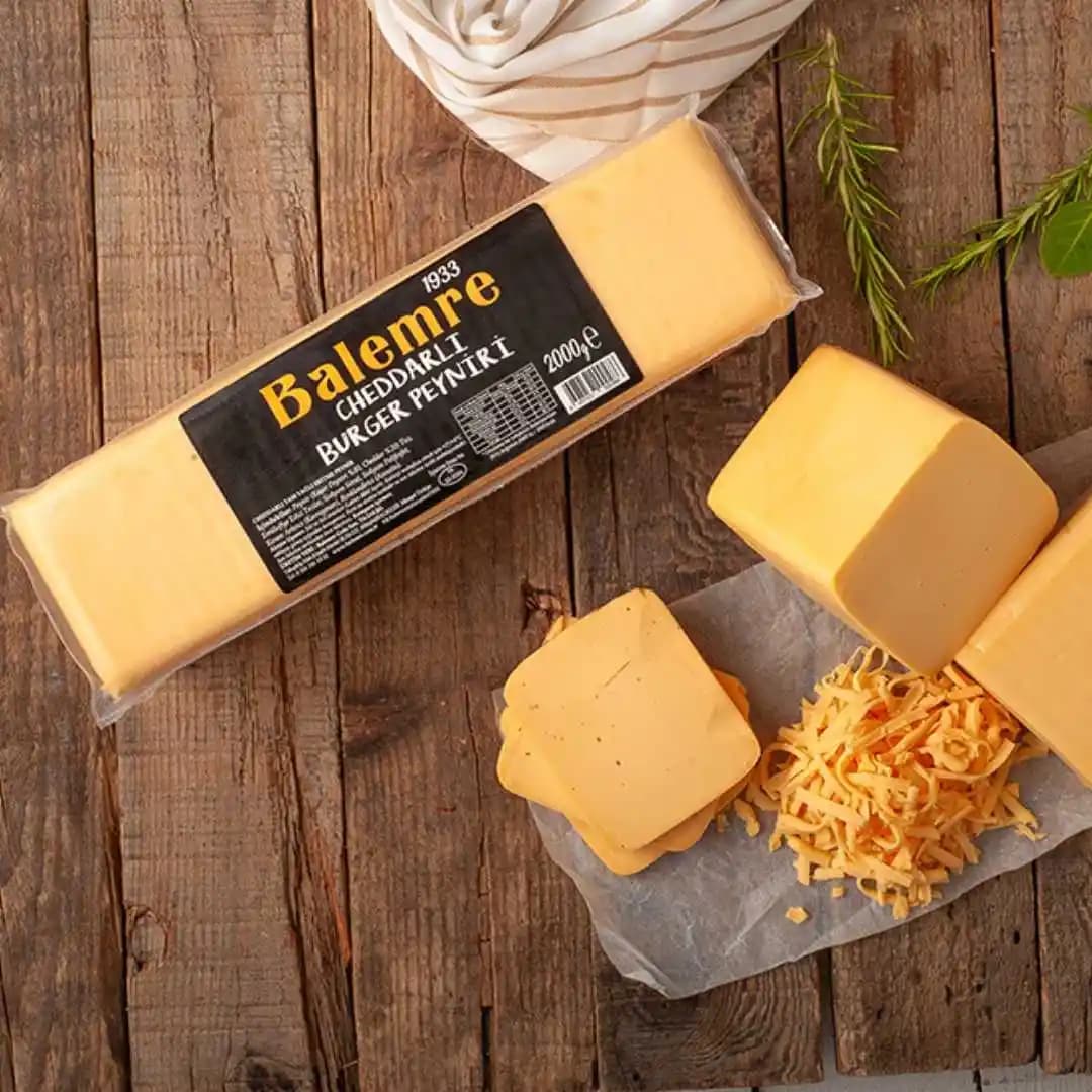 Yüksek Kaliteli Cheddar Peyniri Seçerken Bilmeniz Gerekenler ve Üretim Süreçleri